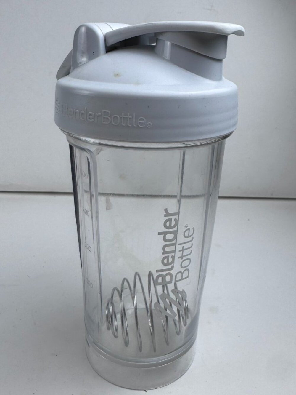 BlenderBottle Pro24 Shaker Cup 24 oz Gray Lid With Wire Whisk Ball stained